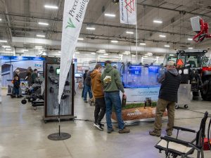 People looking at displays during Keystone Farm Show 2025